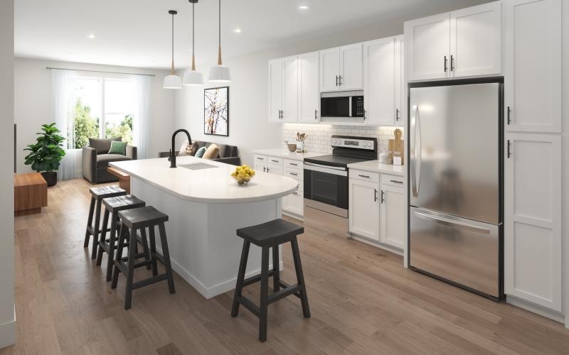 a kitchen with white cabinets