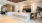  A reception area with a white reception desk and the words "Welcome Home" on it.