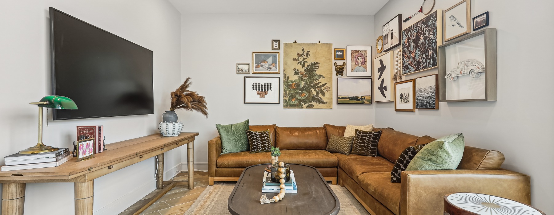 Lounge area with a couch and tv