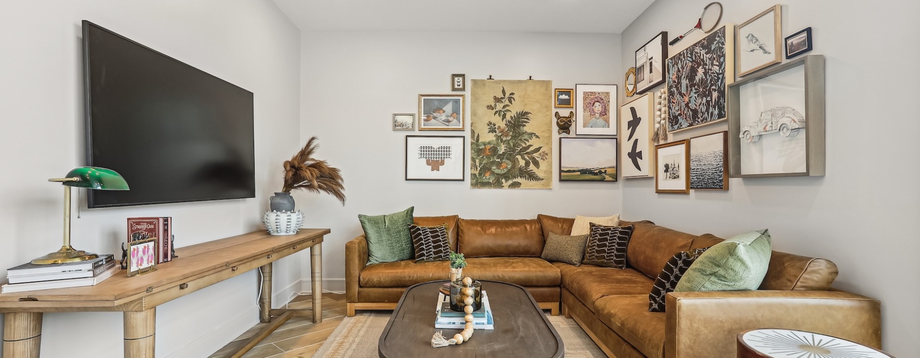 Lounge area with a couch and tv
