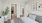 Bedroom with attached bathroom and a plant