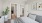 Bedroom with attached bathroom and a plant