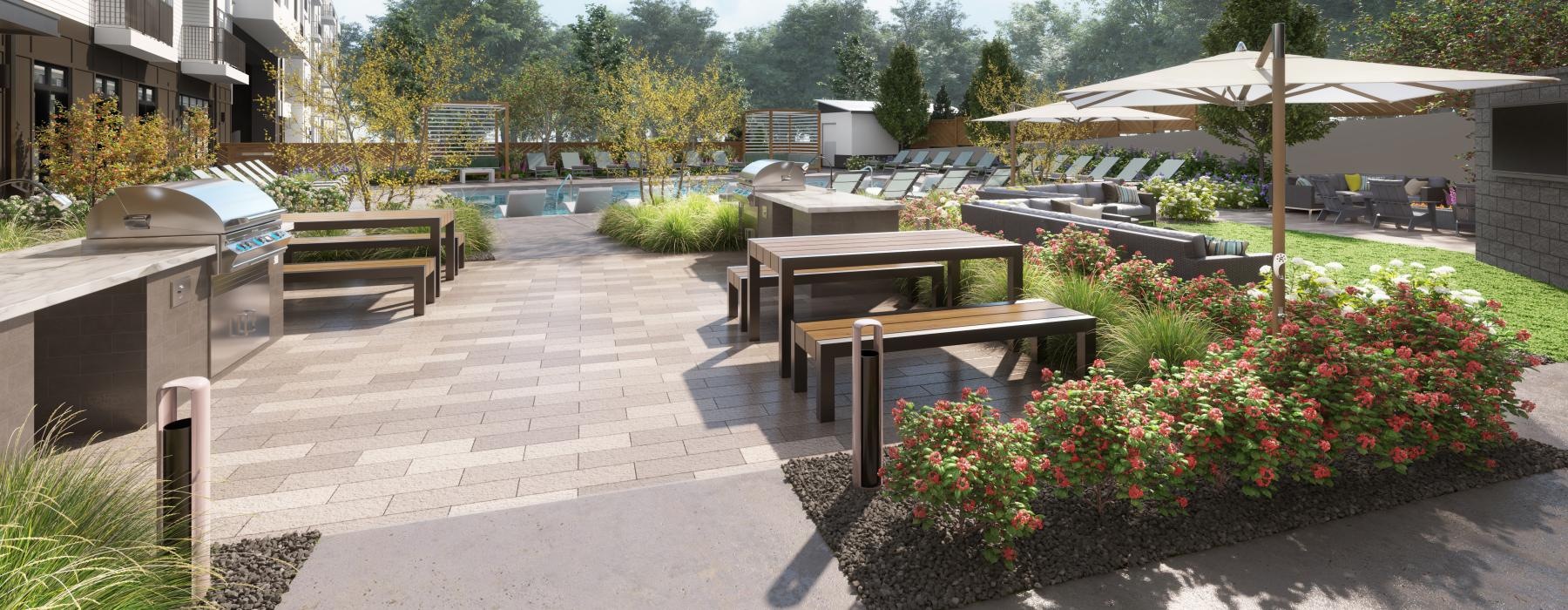 a courtyard with tables and chairs and umbrellas and plants